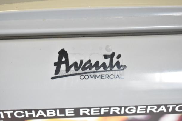 Avanti CFC436Q0WG chest freezer, commercial logo visible. 115V, 1 phase, on commercial casters. Condition appears good.