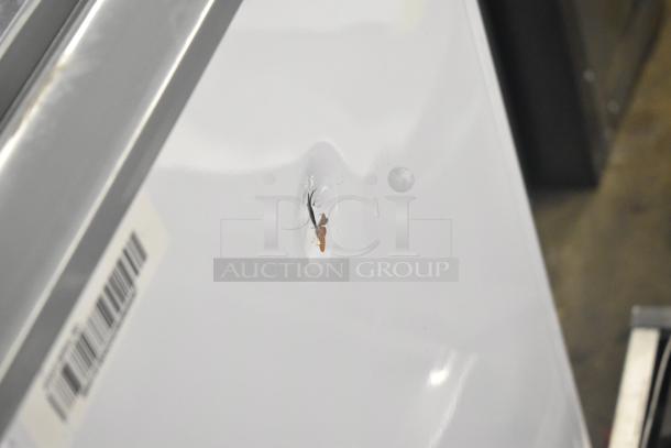 Avanti CFC436Q0WG chest freezer side view, small dent visible; commercial casters, 115V, 1 phase, barcode label.