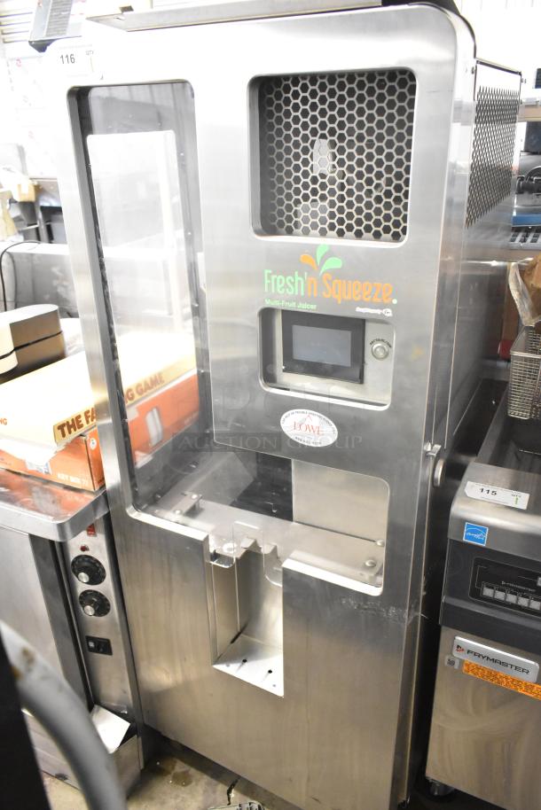 LATE MODEL JBT 2ND-GEN-MFJ-HE Fresh N Squeeze citrus juicer, commercial floor style, 120V, on casters.
