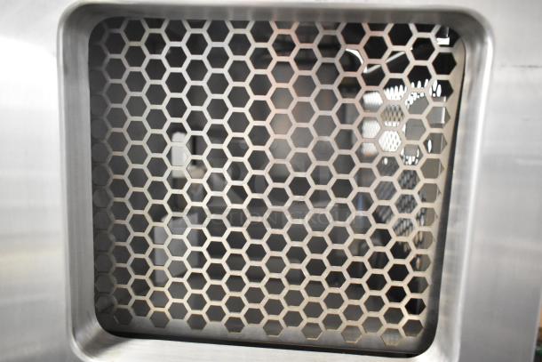 JBT 2ND-GEN-MFJ-HE Citrus Juicer vent detail. Commercial-grade, stainless steel, hexagonal design. 120 Volts, 1 Phase.
