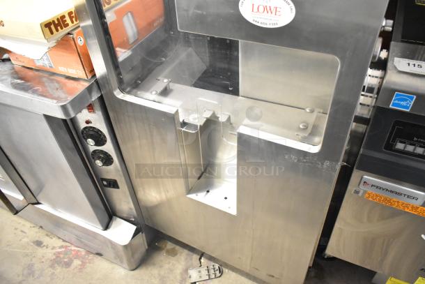 JBT 2ND-GEN-MFJ-HE commercial citrus juicer, stainless steel, floor style, on casters, 120V, 1 Phase, excellent condition.