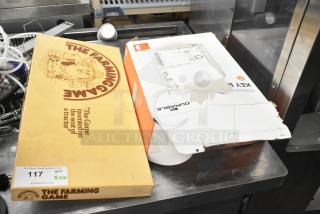 The Farming Game board game in original box with quote, and Durable Key Box, both slightly worn packages.