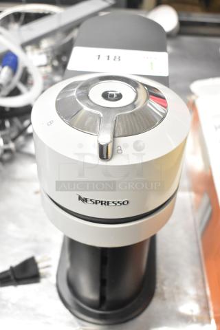 Breville BNV520GRY Nespresso Countertop Espresso Machine, 120V, used, sleek design, visible lock icons, power cable shown.