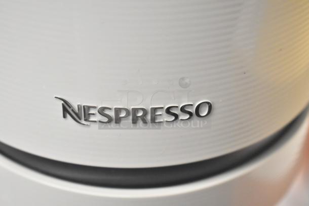 Breville BNV520GRY Nespresso machine, gray, countertop model. Features Nespresso logo. 120 Volts, 1 Phase.