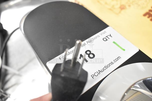 Breville BNV520GRY Nespresso Espresso Machine with power cord. Auction tag indicates quantity: 1. Model: BNV520GRY.