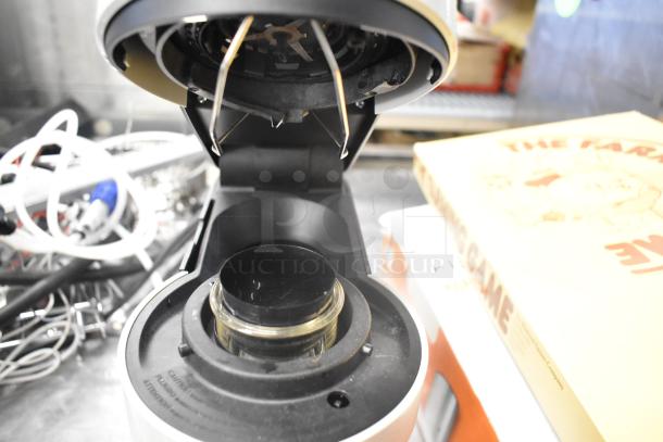 Breville BNV520GRY Nespresso machine with open lid, showcasing internal components. Condition: lightly used. 120V, 1 Phase.