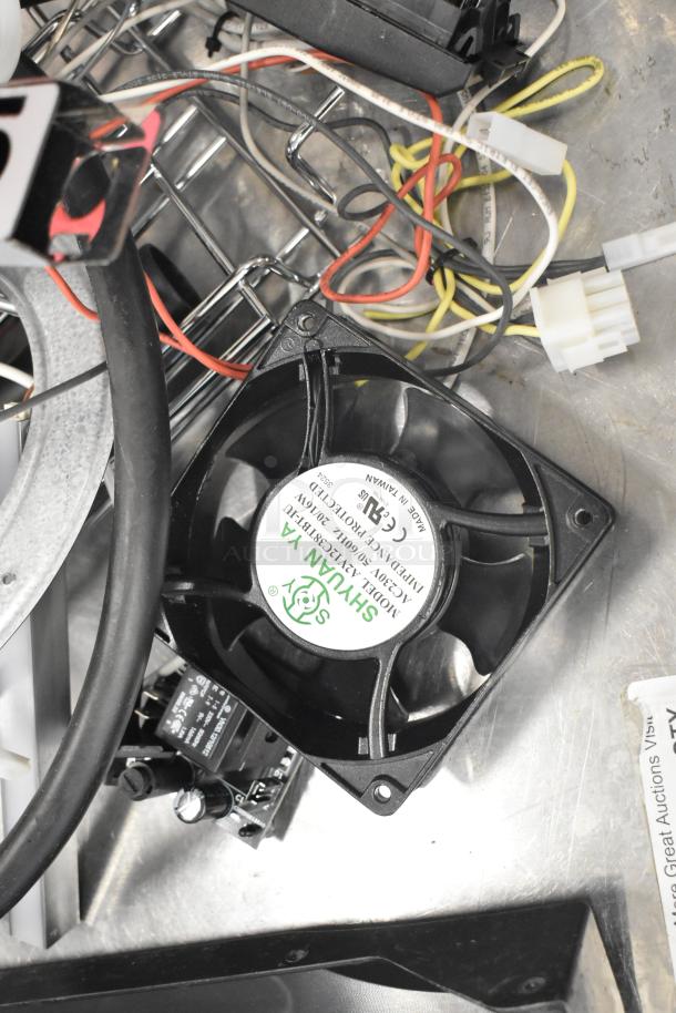 Assorted electronic components including a blower wheel and ballasts, with wiring. Includes Sanyo fan model 9A20GY049JP01.