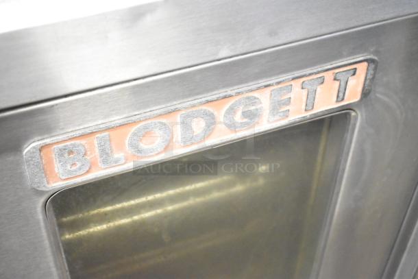 Blodgett commercial convection oven with view-through glass door, solid door, and thermostatic controls. Brand logo visible.
