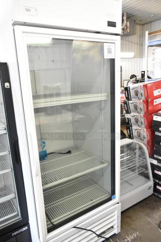 2024 True TSCI-600R-G-PH commercial single door reach-in cooler merchandiser. 115V, glass door, shelving included.