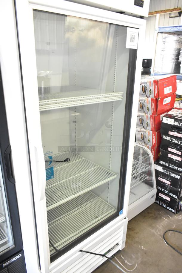 2024 True TSCI-600R-G-PH single door reach-in cooler. New, 115V, 1 Phase. Clear glass door, white interior with shelves.