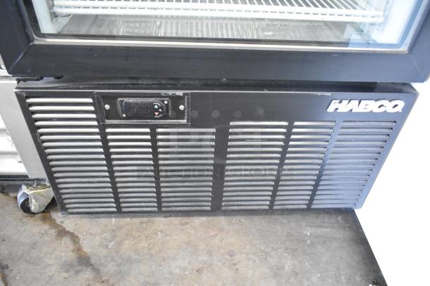 Habco SE12 Commercial Cooler, single door, 115V, 1 phase. Features temperature gauge, black vent panel.