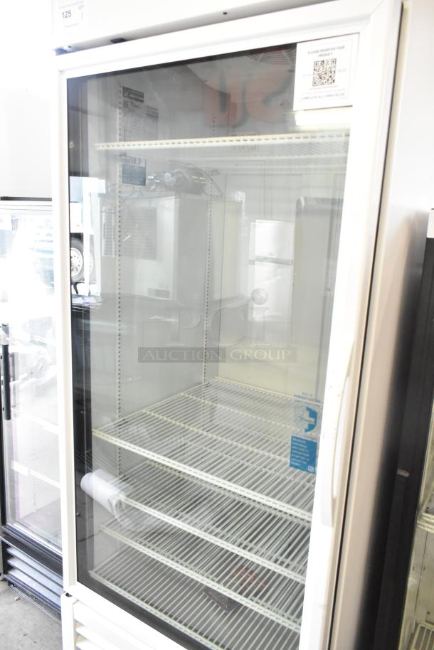 2025 True TSCI-600R-G-PH commercial single door reach-in cooler merchandiser, 115V, glass door, white finish, excellent condition.
