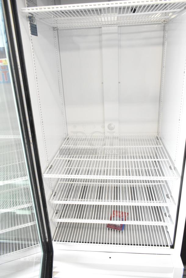 2025 True TSCI-600R-G-PH commercial reach-in cooler, single glass door, shelving, 115V, excellent condition.