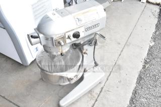 Hobart A120 12-quart dough mixer with bowl, whisk, and paddle, 115V, 1 phase. Used condition, silver finish.