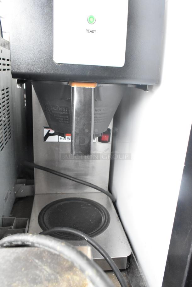 2017 Fetco CBS-2121 drip coffee machine, commercial countertop model, 100-120V, 1 Phase. Visible controls and hot water warning.