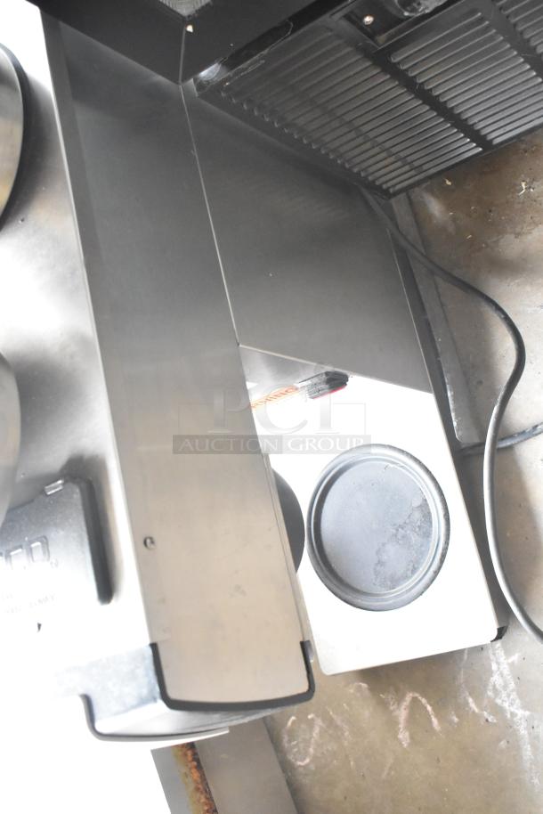 2017 Fetco CBS-2121 commercial drip coffee machine, stainless steel, 100-120V, 1 phase, used condition, visible power cord.