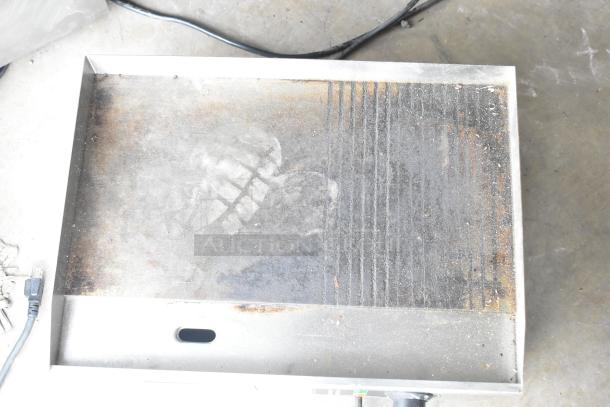 2024 Vevor HT-821 countertop electric griddle, worn surface, 115 volts, 1 phase. Used condition, visible plug and electrical cord.