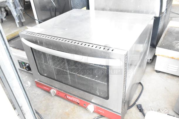 Avantco CO-16 half-size countertop convection oven, 1.5 cu. ft., stainless steel, 120 volts, good condition, visible controls.