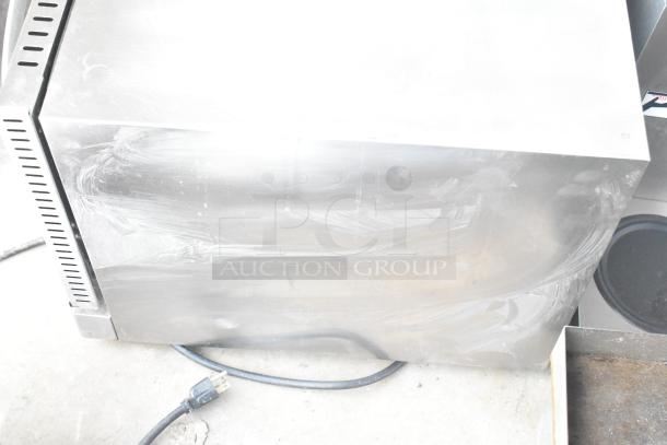 Avantco CO-16 convection oven, half-size, stainless steel, 1.5 cu. ft., electric, 120V, visible surface marks.