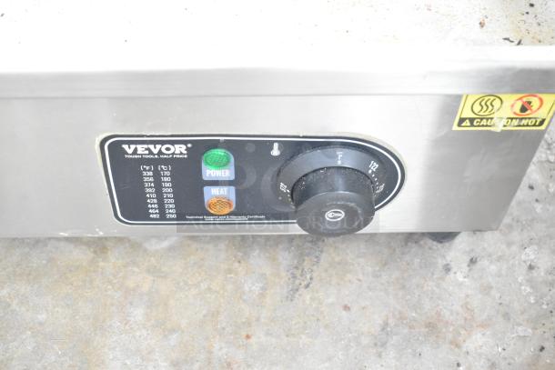 Vevor HT-821 countertop electric griddle, 120 volts, single phase. Features power and heat controls, caution indicator.