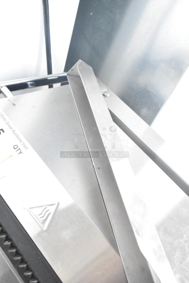 2021 Avantco 177P78 countertop electric panini press, 120 volts, features stainless steel construction, excellent condition.