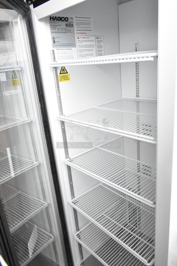 2019 Habco SE18HC commercial cooler, single glass door, shelves visible, 115V, warning labels inside.