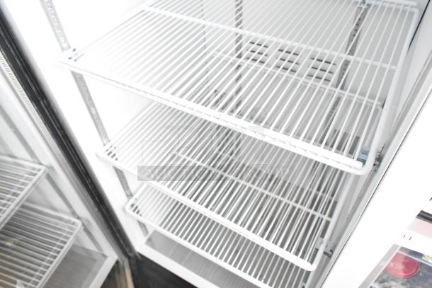 2019 Habco SE18HC single door reach-in cooler merchandiser, commercial use, white wire shelves, 115 volts, 1 phase.