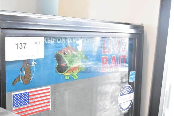 True GDM-12 commercial single door cooler merchandiser, 115 volts, branding for live bait. Auction tag and stickers visible.