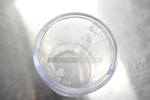 Clear poly pitcher with "Made in USA" marking on base, part of auction lot of 10 items including red poly bucket.