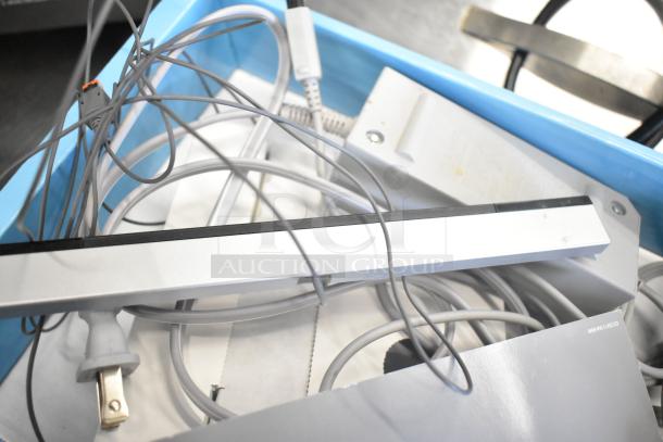 Nintendo Wii game console with original box and cables. Model RVL-001. 115 volts, 1 phase.