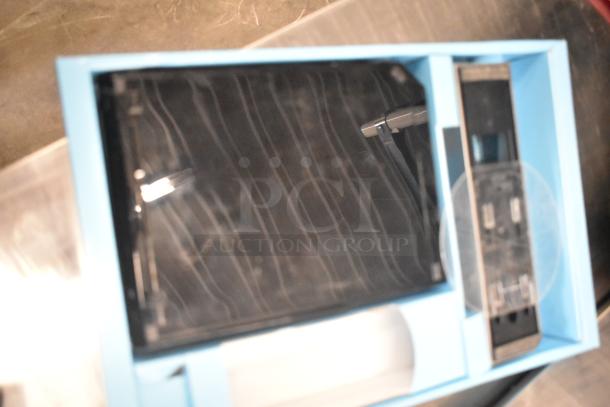 Nintendo Wii Game Console in original box. Includes power cord and AV cable. Condition appears unused. 115 Volts, 1 Phase.