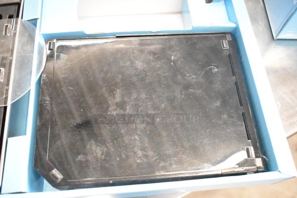 Nintendo Wii console in original box, 115 volts, 1 phase. Appears in used condition with visible surface marks.
