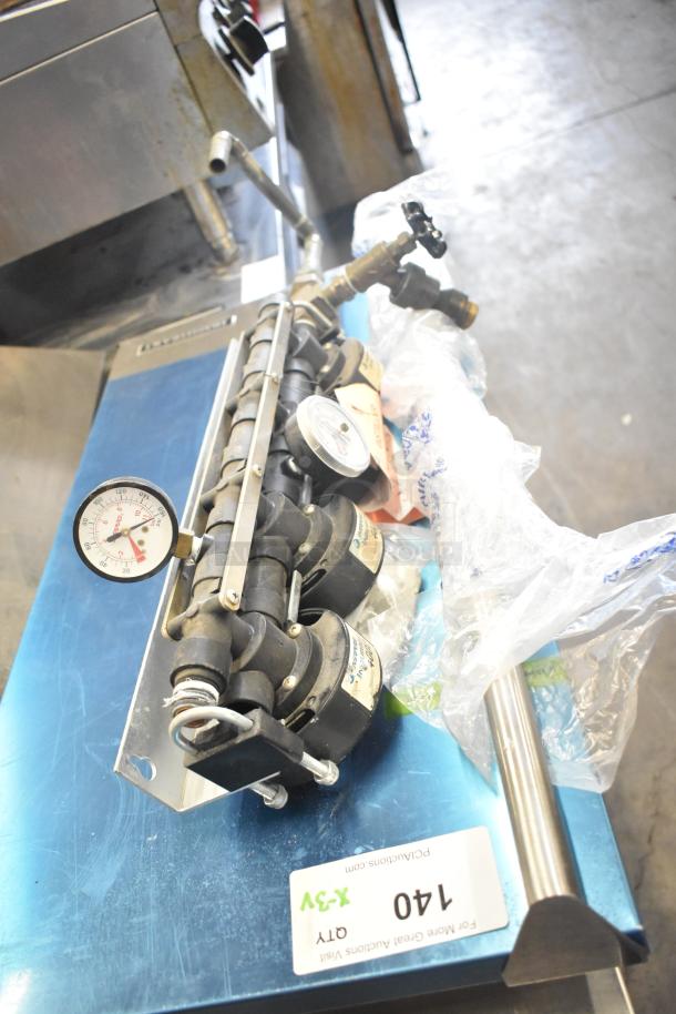 3 items: Everpure 4000 water filter head, CL40FC-B Marinco cap, Hoshizaki ice machine door. Includes gauges. Appears used.