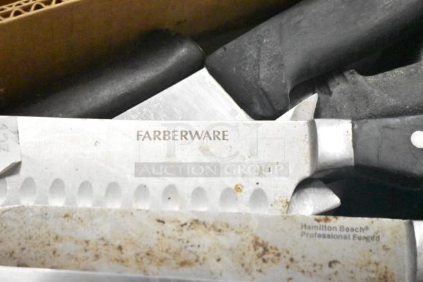 Close-up of stainless steel knives, including a Farberware and Hamilton Beach professional forged knife, showing wear.