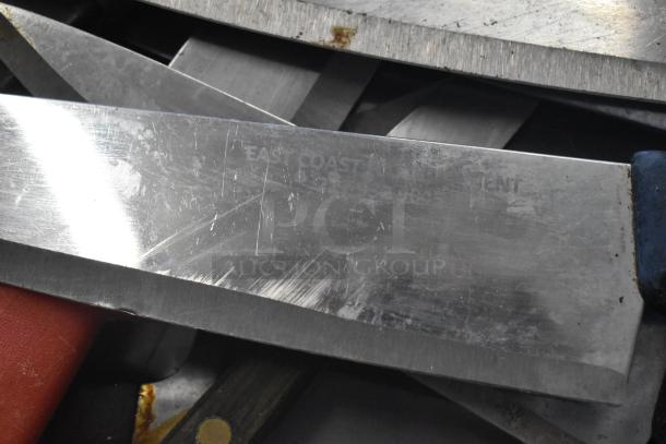 160 sharpened stainless steel knives, including a chef knife. Visible wear, marked "EAST COAST." Auction lot value.