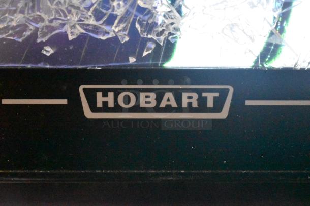 2017 Hobart HTi-7LH26 commercial scale with screen damage, no power cord. Hobart logo visible. 120/208-240V, 1 phase.