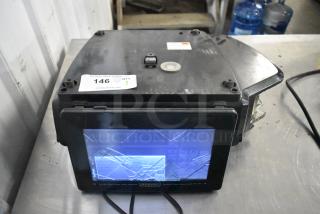 Hobart commercial countertop scale with cracked screen; no power cord. Tested, working, 120/208-240V, 1 phase. Auction tag visible.