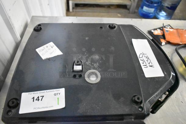 2020 Hobart HTi-7LH4W Commercial Countertop Scale in black. Tested and working. Visible tags indicate "Used Asset."