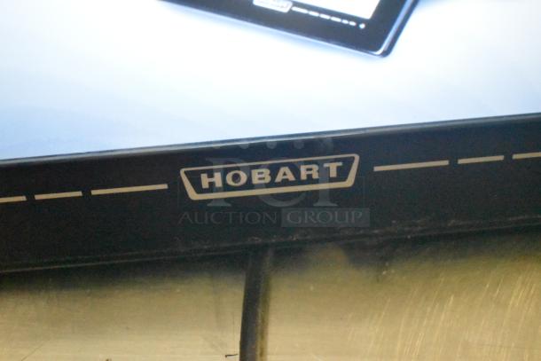2017 Hobart HTi-7LH26 commercial countertop scale, black with logo, tested and working, suitable for 120/208-240V, 1 phase.