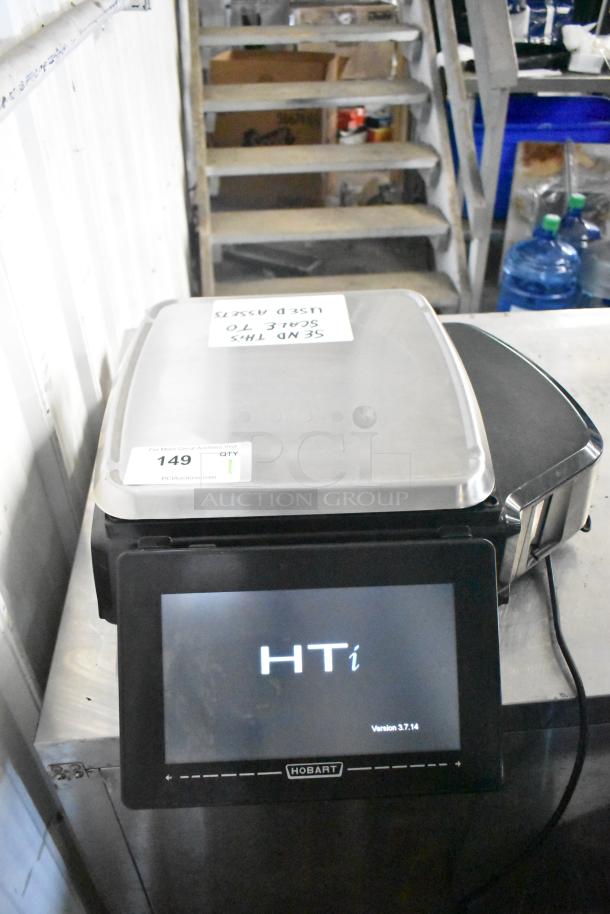 2024 Hobart HTi-7LH4W commercial countertop scale, tested and working. Features digital display, model label visible.