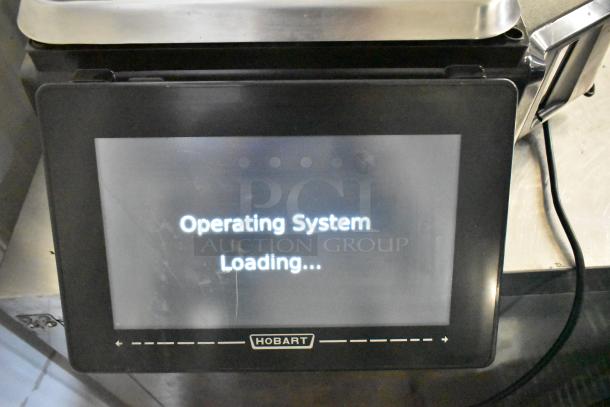 2024 Hobart HTi-7LH4W commercial countertop scale, operating system loading, tested and working, 120/208-240V, 1 phase.