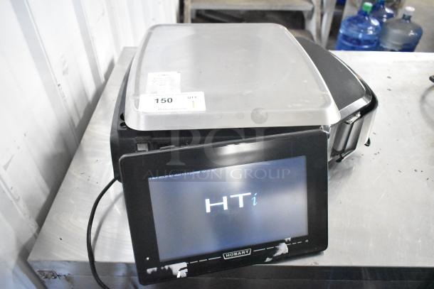 2018 Hobart HTi-7LH26 commercial countertop scale, tested and working, 120/208-240 volts, 1 phase, visible markings on display.