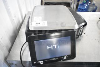 2018 Hobart HTi-7LH26 commercial countertop scale, tested and working, 120/208-240 volts, 1 phase, visible markings on display.