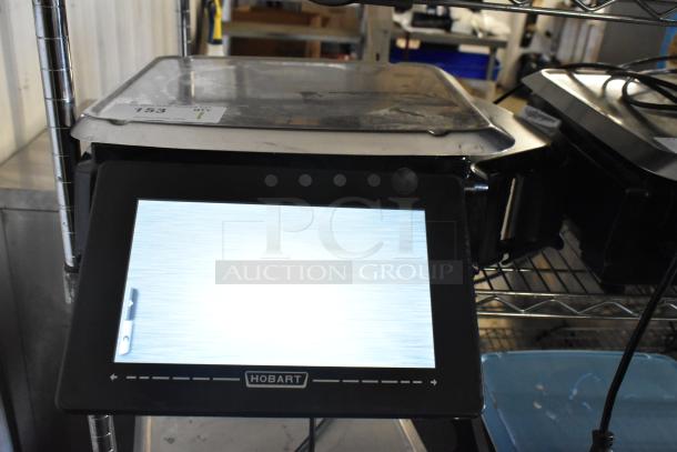 2024 Hobart HTi-7LH4W commercial scale, no power cord, tested and working. Touchscreen display, model HTi-7LH4W.