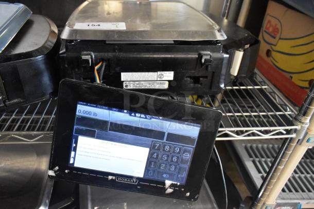2018 Hobart HTi-7LH26 commercial countertop scale. Tested, working condition. Digital display. 120/208-240V, 1 Phase.