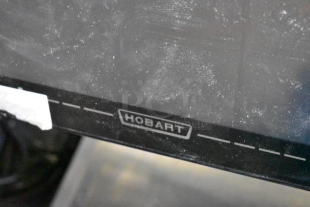 2023 Hobart HTi-7LH4W commercial scale, tested and working. Black finish, Hobart logo visible. 120/208-240V, 1 phase.