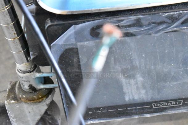 Hobart commercial countertop scale with a cut power cord, features 120/208-240 volts, 1 phase. Condition unknown.