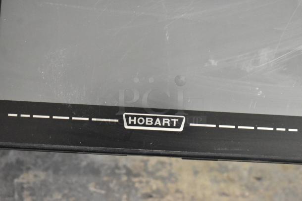 2017 Hobart HTi-7LH26 commercial countertop scale, black finish, tested and working, visible Hobart logo.