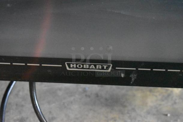 Hobart Commercial Countertop Scale, model with bent plug head, 120/208-240V, 1 phase, black with visible Hobart logo.