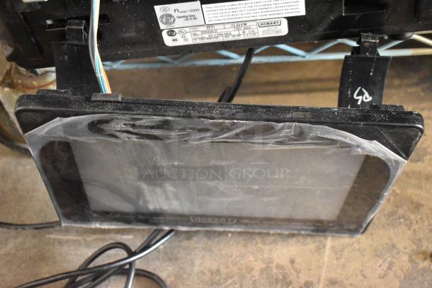 2024 Hobart HTi-7LH4W commercial countertop scale, 120/208-240V, 1 phase, inoperative, visible label details.